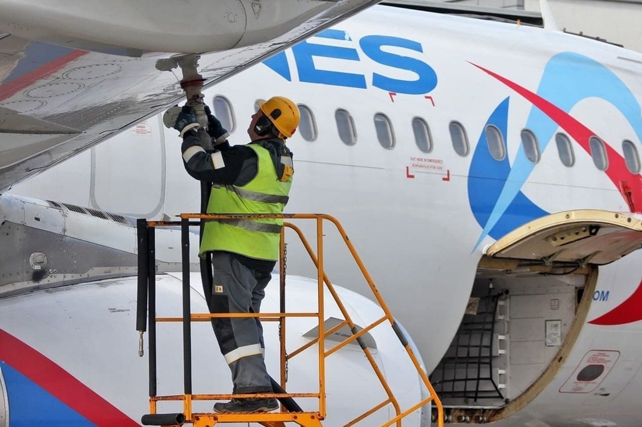 An engineer at work on the airframe